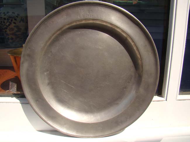 A fine 18th century English pewter charger dated 1745 made by Edward Box of London